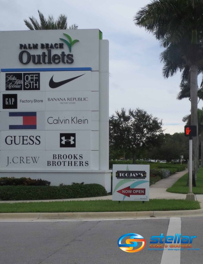 Now open signs for the Palm Beach Outlets mall